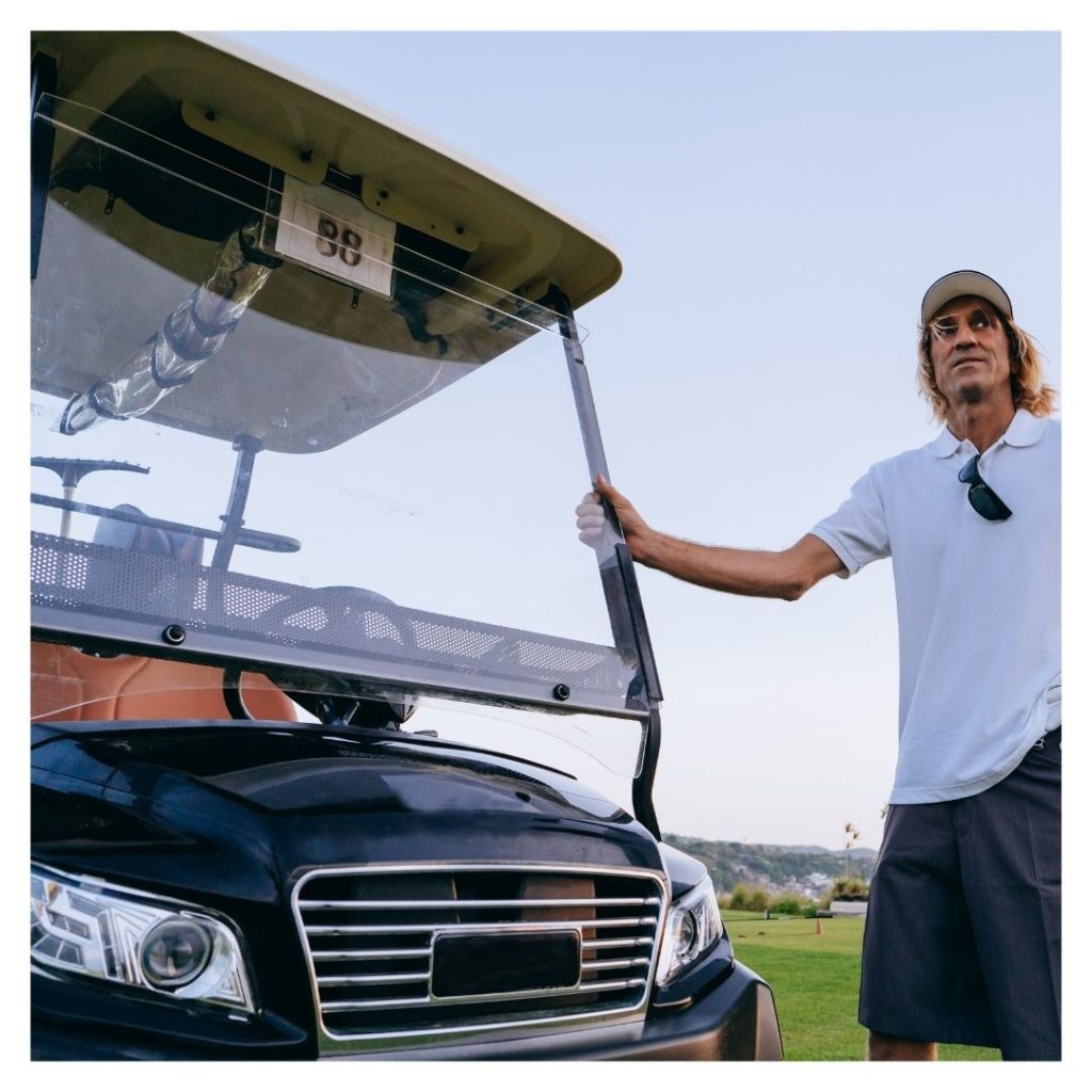 man with golf cart